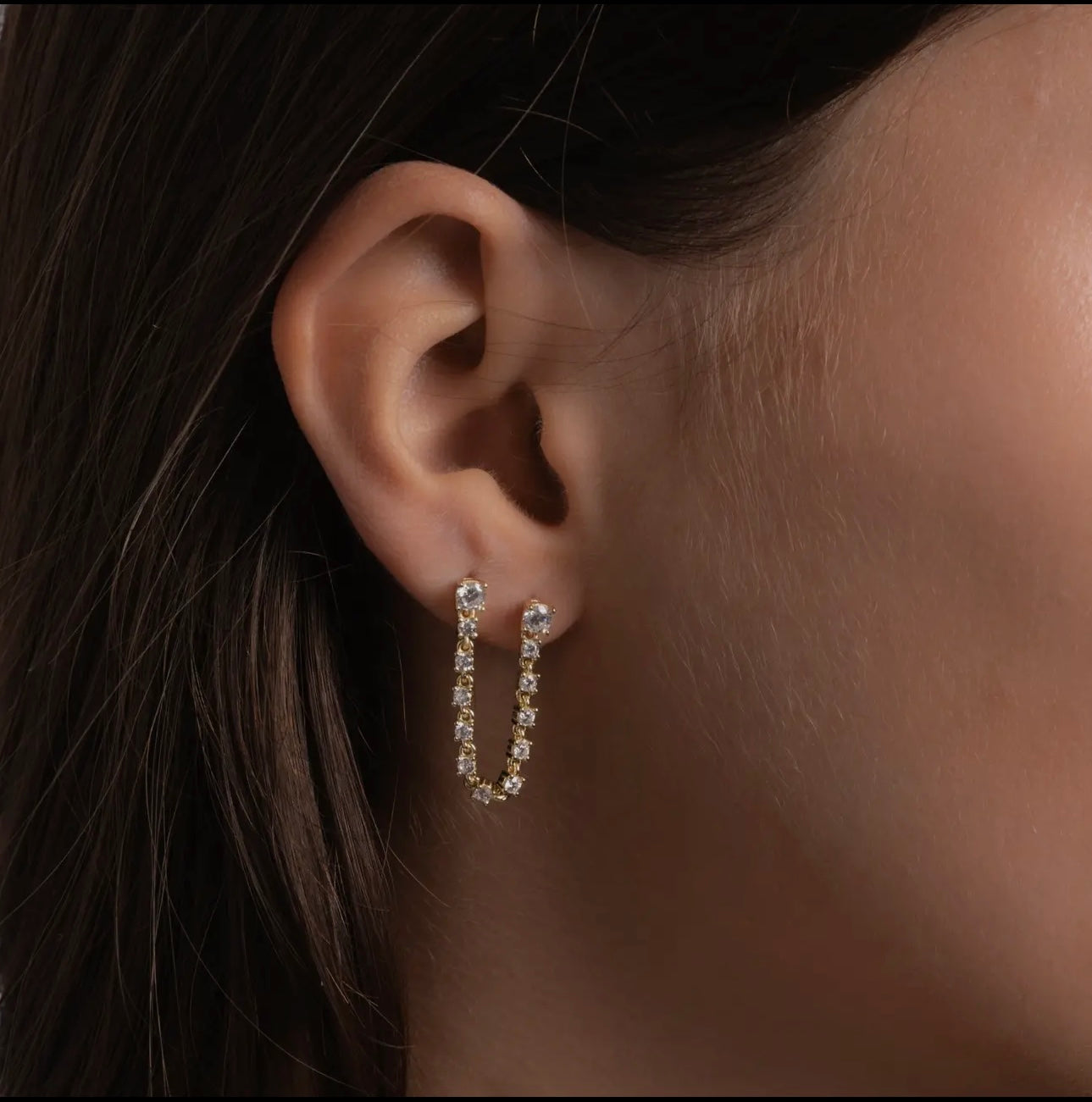 Two piercing chain studs