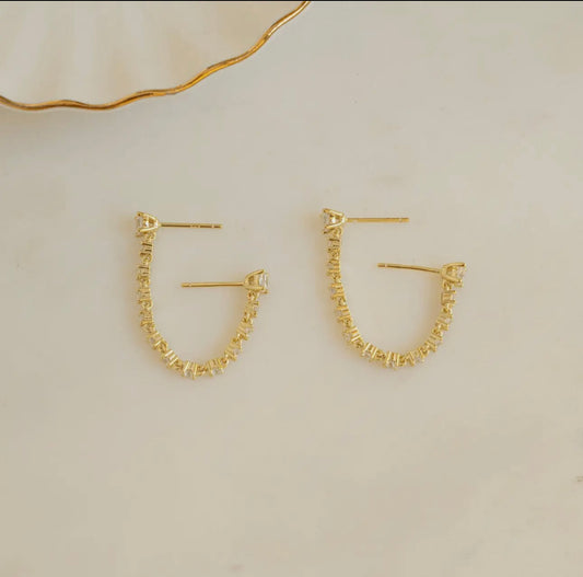 Two piercing chain studs