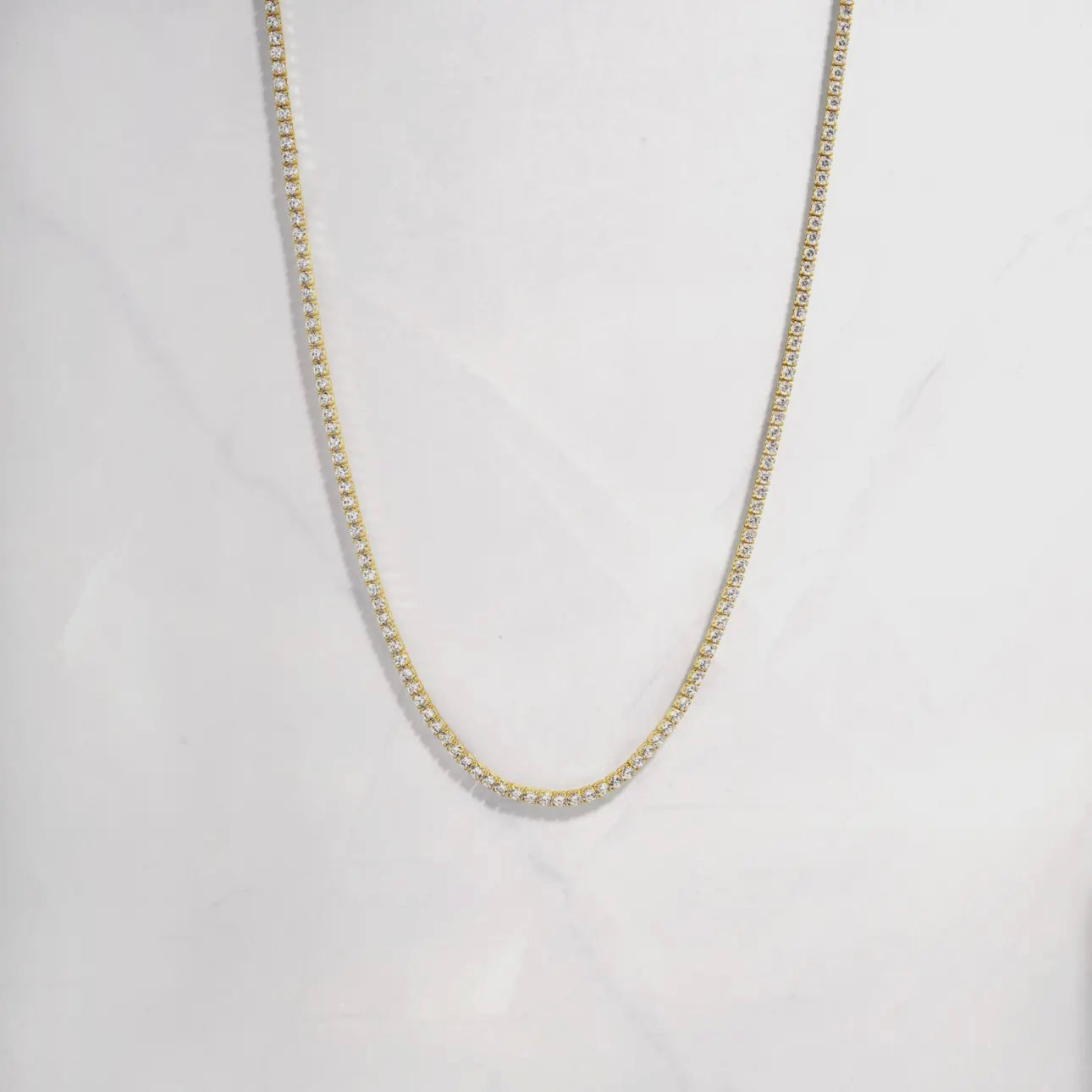 Gold tennis necklace
